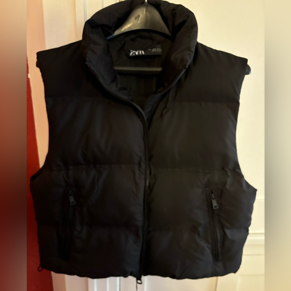 Black puffer vest. Brand new